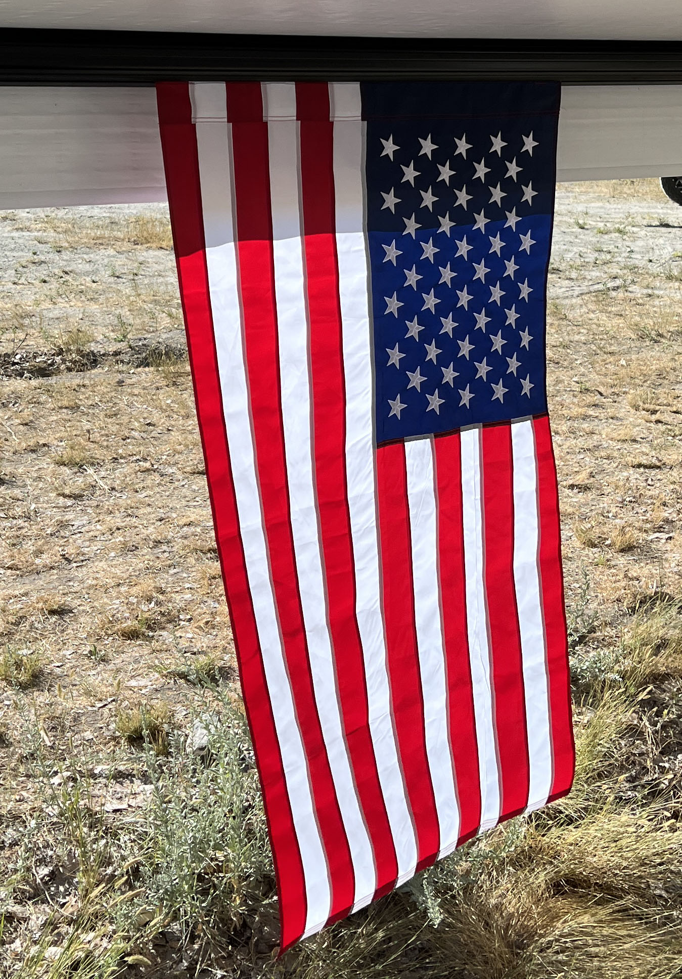 RVFlag American flag displayed on RV awning